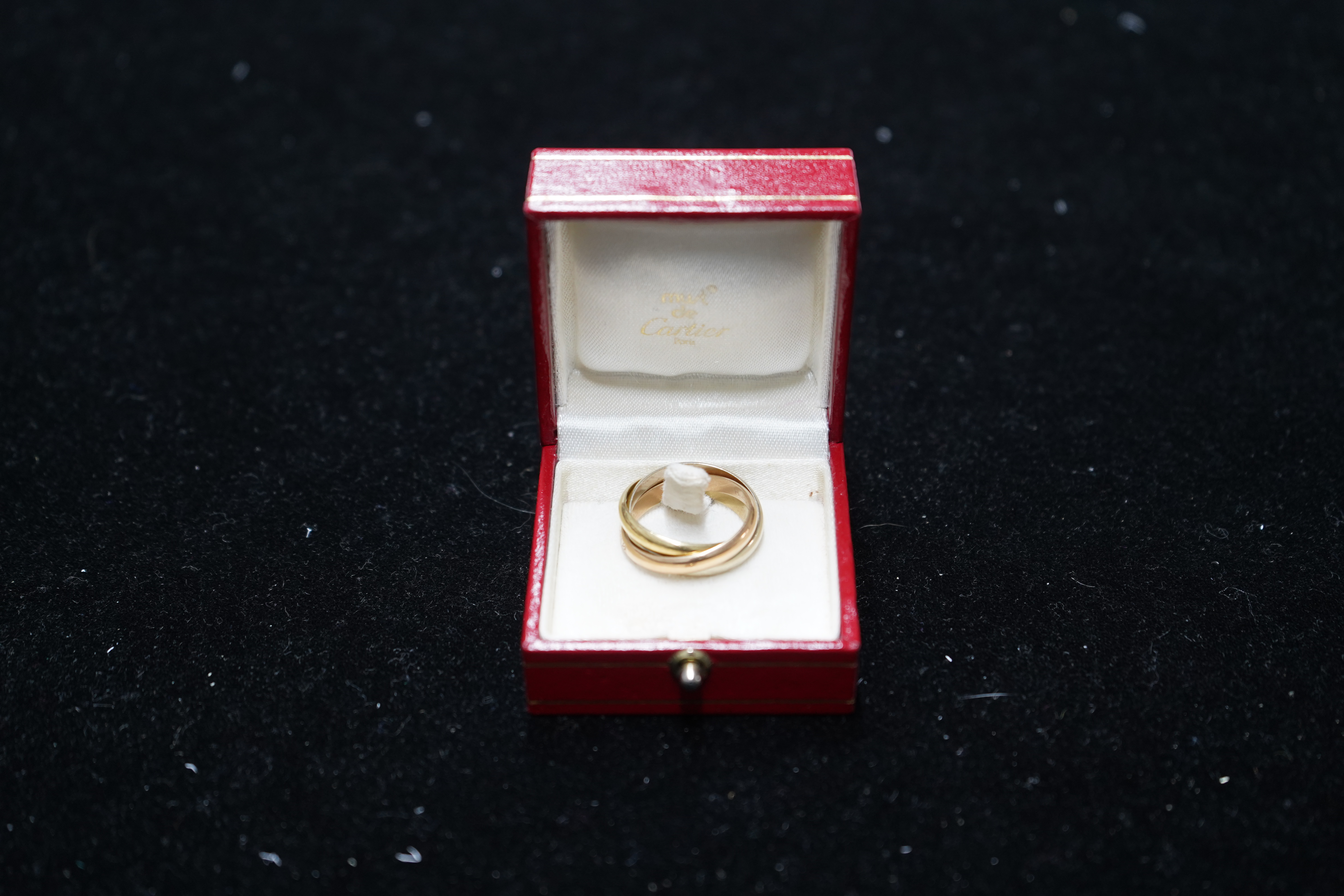 A modern Must De Cartier three colour 18k gold triple band 'Russian' wedding ring